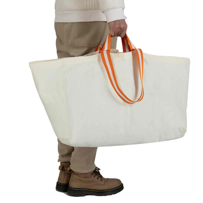 Opbevaringspose 70L canvas taske med orange håndtag, ideel til transport af festivaludstyr.