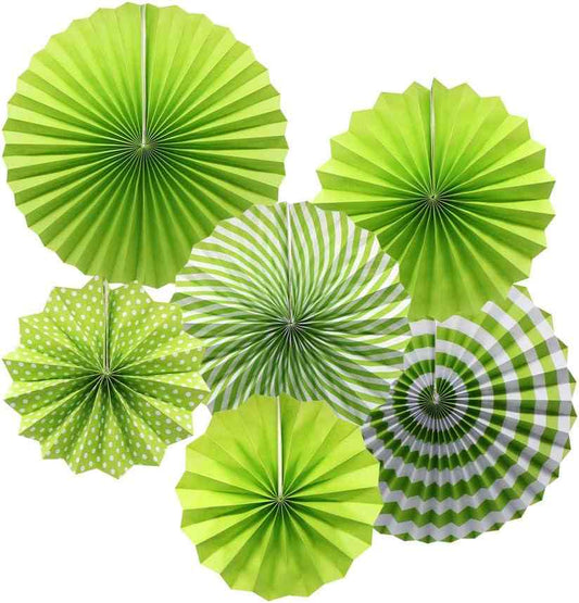 Decorative green paper fans for events and outdoor gatherings.