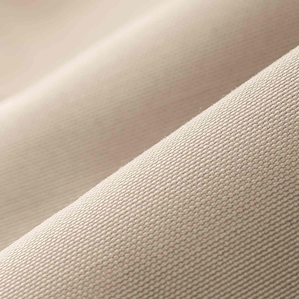 Close-up of beige toilettaske showing water-resistant material texture.